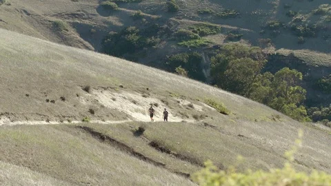 Two man hiking up a trail 스톡 동영상 88285134