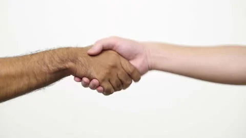 Two man holding hands, handshake gesture isolated on white background in studio. Stock Footage 144654033