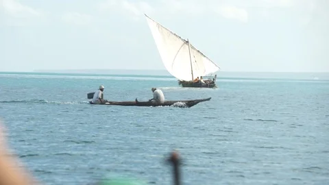 Two man sailing on a boat in open sea Stock Footage 85775762