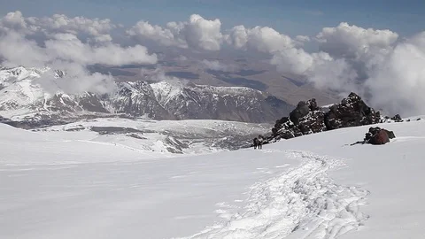 Two man on the slope of mountain Stock Footage 83729682