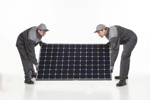 Two man with solar battery Stock Photos