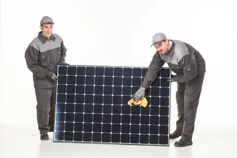 Two man with solar battery Stock Photos