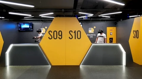 Two man in VR glasses are playing video games. People have fun Stock Footage 99137463