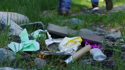 Two man walk away leaving garbage dump in the forest Environmental problem very Stock Footage 76009310