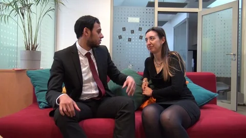 Two managers chatting passionately in the break room Stock Footage 126231770