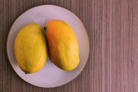 Two mangoes Stock Photos