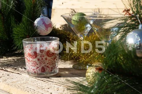 Two martini glasses surrounded by new year decorations Stock Photos