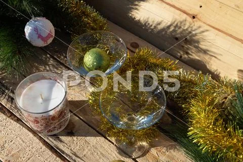 Two martini glasses surrounded by new year decorations Stock Photos