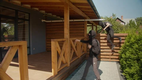 Two Masked Burglars Break Into Private Home Yard, Security Alarm Video stock 291935801