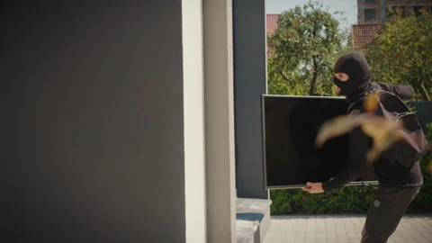 Two Masked Burglars Steal Electronics from Home and Escape Stock Footage 291939689