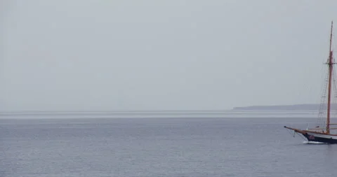 Two masted sail ship sailing on engines at Puerto del Carmen. Entering an 動画素材 336724220
