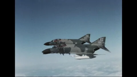 Two McDonnell Douglas F-4D Phantom II aircrafts in flight - 1967 Stock Footage 103758326