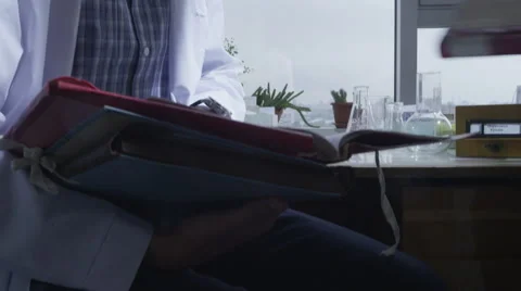 Two medical students preparing for the exam in the library Stock Footage 62554422