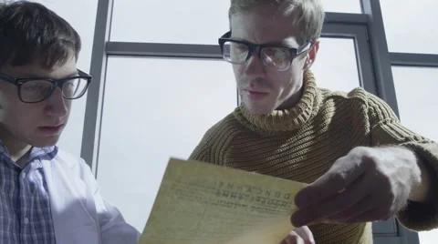 Two medical students preparing for the exam in the library Stock Footage 62554582