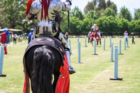 Two medieval knights confront during jousting tournament Stock Photos