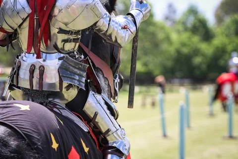 Two medieval knights confront during jousting tournament Stock Photos