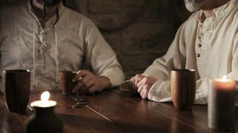 Two medieval looking men are gambling Video stock 59084227
