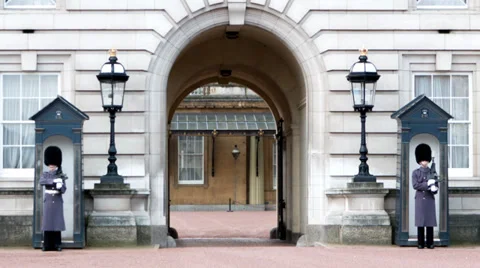 Two Members of the Queen's Guard outside Buckingham Palace (1) - London UK Stock Footage 36318043