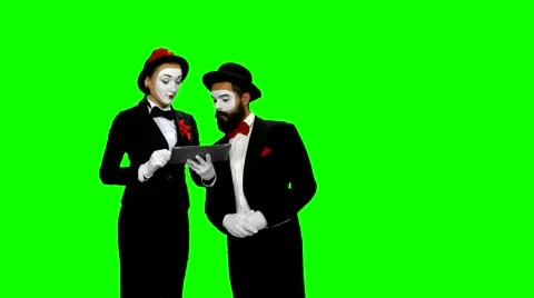 Two memes dicusses something using tablet computer on green screen Stock-Footage 47924844