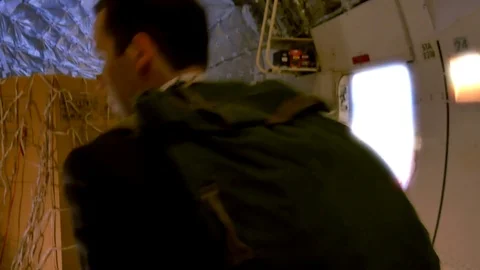 Two men agents battle in fight scene on Airplane 스톡 동영상 73705881
