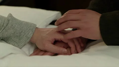 The two men are holding hands Stock Footage 261641963