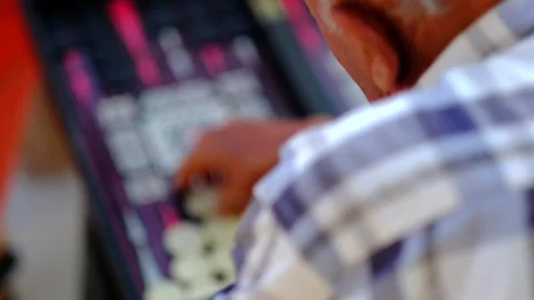 Two men are playing backgammon Stock Footage 249040878