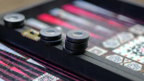 Two men are playing backgammon close up Stock Footage 249042839