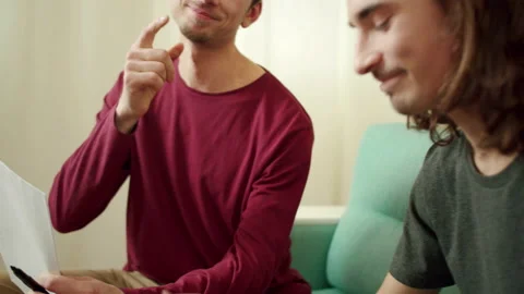 Two men are shaking their hands during working Stock Footage 160170614