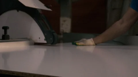 Two men are working at the machine. Processing of wooden structures for the cabi Stock Footage 125427053