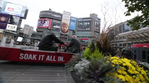 Two men on a bench in courtyard Stock Footage 61830847