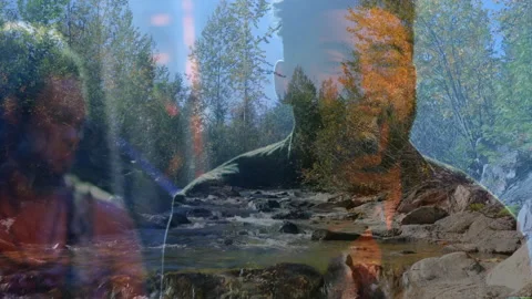 Two men blending double-exposure river animation with marketing design elements Stock Footage 307652316