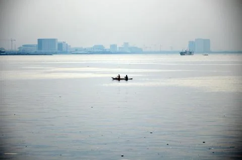 Two men in a boat Foto stock