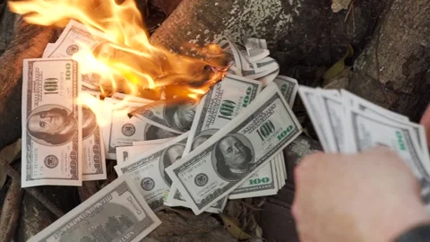 Two men burn fake dollars in a money offering ritual in Vietnam Video stock 290121793