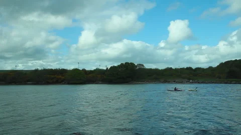 Two men in canoes one fallen into the water Video stock 236712700