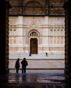 Two men chat in the Piazza Maggiore Bologna Stock Photos