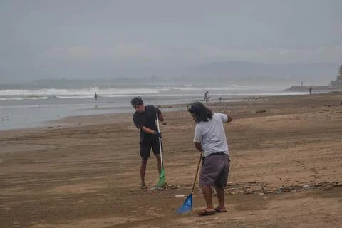 Two Men Cleaning Beach Plastic Stock Photos