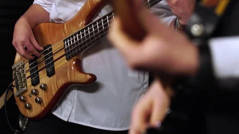 Two men close-up of an electric guitar Stock Footage 81760970
