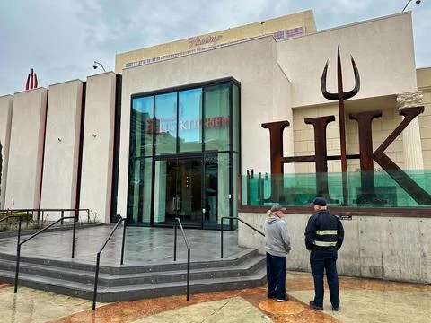 Two Men Considering Hell's Kitchen by Ramsey Stock Photos