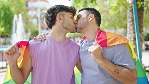 Two men couple hugging each other holdin... | Stock Video | Pond5