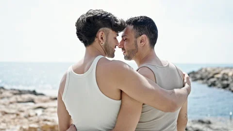 Two men couple hugging each other and ki... | Stock Video | Pond5