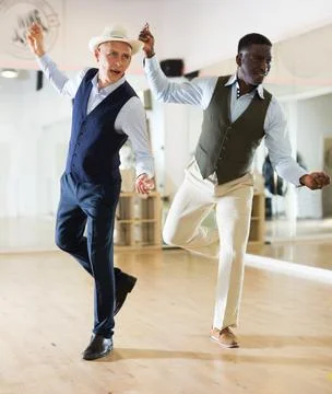 Two men dancing jazz in studio Stock Photos