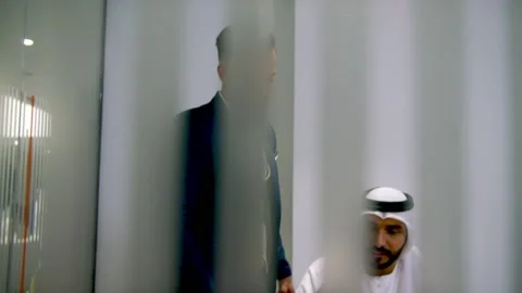Two men discussing in an office. Stock Footage 237079092