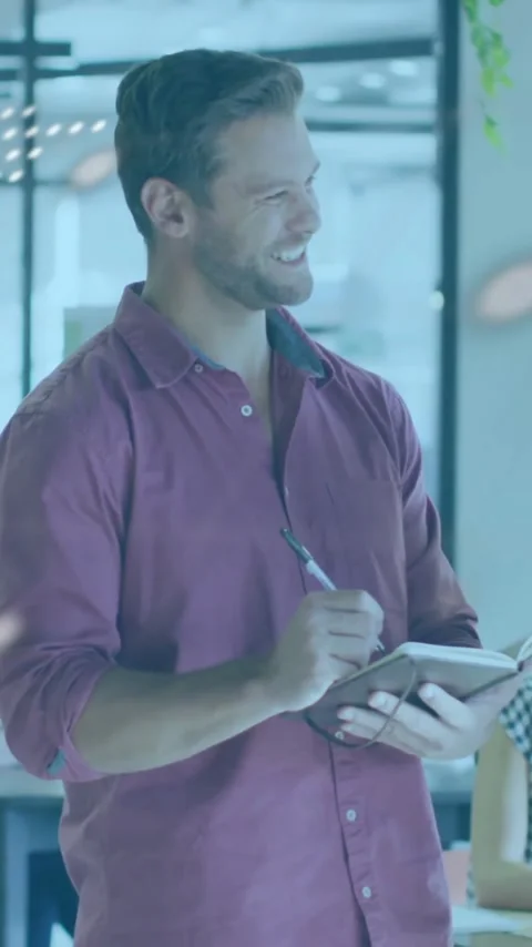 Two men discussing in office with software code animation overlay Stock Footage 344332034