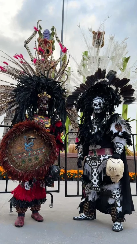 Two Men dressed as pre-Hispanic skulls on Day of the Dead Stock Footage 291576977