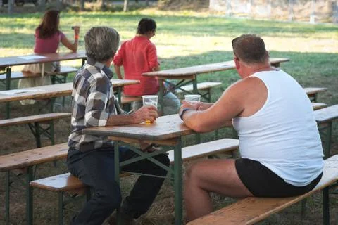 Two Men Drinking Beer Stock Photos