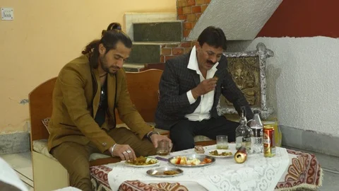 Two men drinking &amp; smoking cigarette at Home Vídeos de archivo 124472535