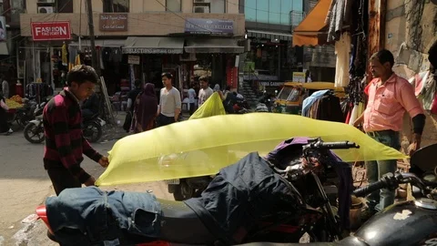 Two Men Drying Fabrics After Dyeing . Delhi, India. Stock Footage 122972172