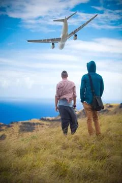 Two men on the edge of the Rano Kau volcano Stock Photos