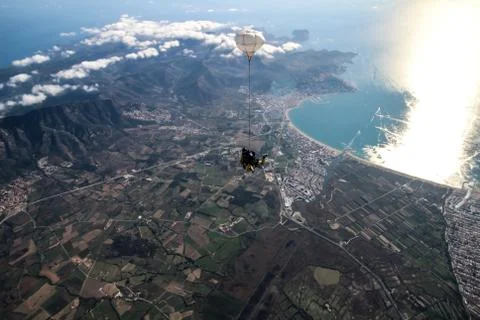Two men enjoys sky diving. Stock Photos