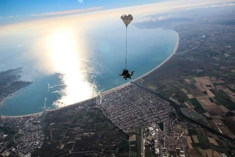 Two men enjoys sky diving. Stock Photos